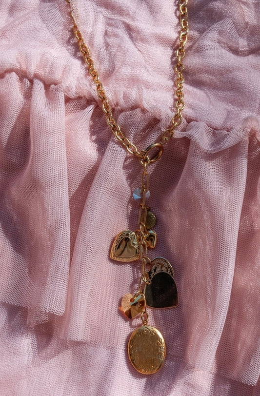 follow your heart long charm necklace