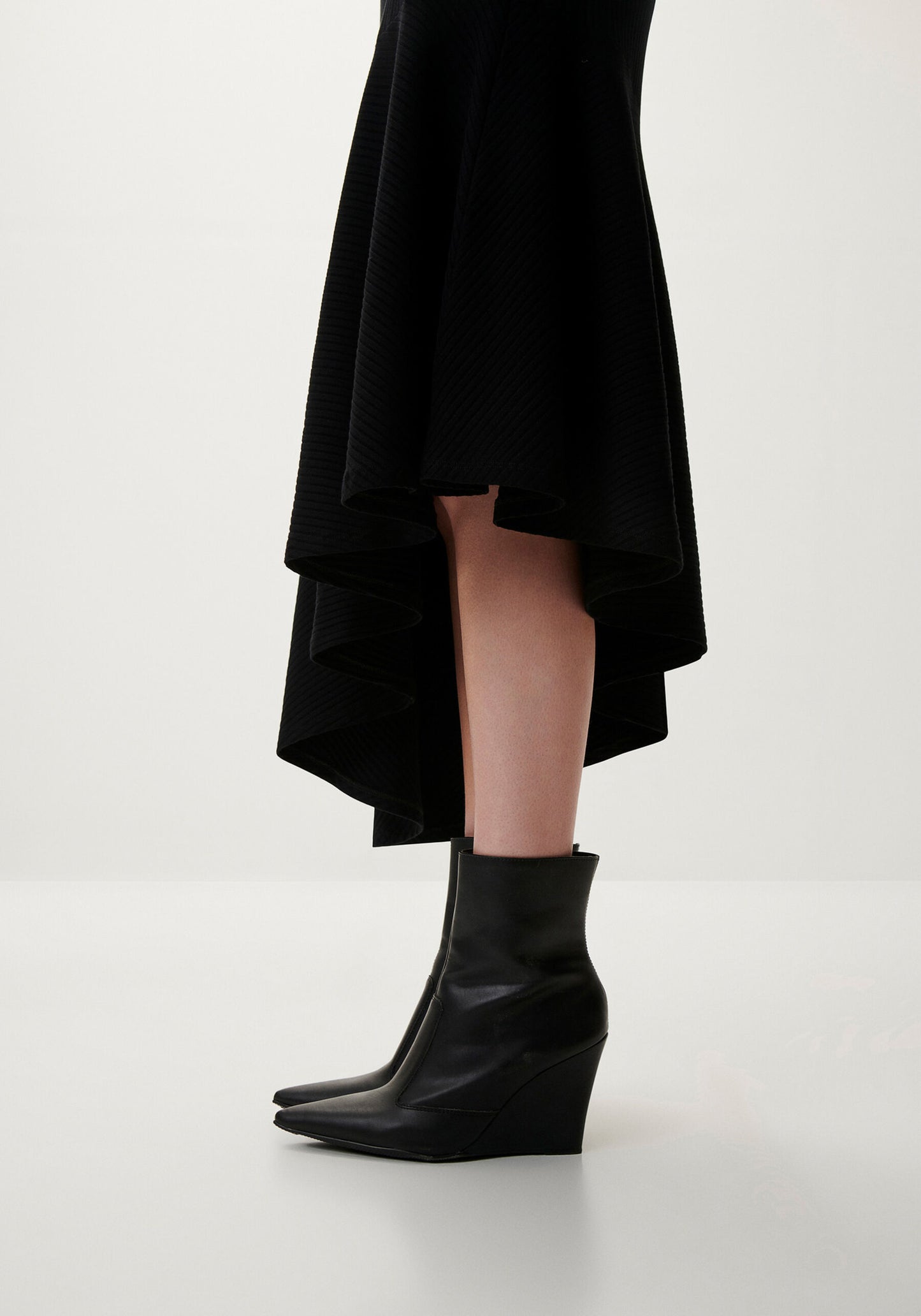 A Symmetrical Ribbed Black Dress